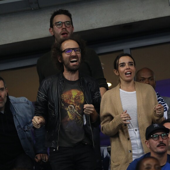 Jalil Lespert, son frère Yannis Lespert, Elodie Bouchez, son mari Thomas Bangalter (groupe Daft Punk), leur fils Roxan et Arnaud Ducret dans les tribunes du stade de France lors du match de ligue des nations opposant la France à l'Allemagne à Saint-Denis, Seine Saint-Denis, France, le 16 octobre 2018.