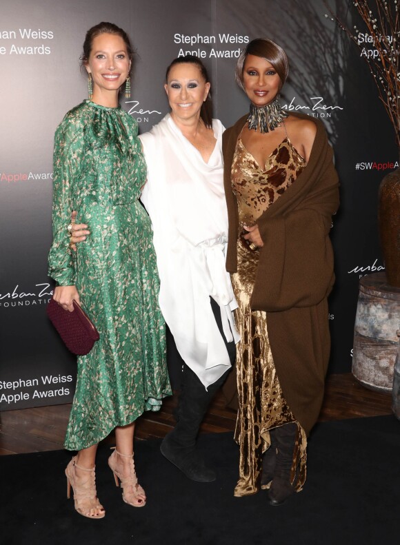 Christy Turlington, Donna Karan and Iman au photocall de la soirée des "Stephan Weiss Apple Awards" à New York, le 24 octobre 2018.
