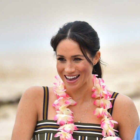 Le prince Harry, duc de Sussex, et Meghan Markle, duchesse de Sussex, enceinte, en visite à Bondi Beach dans la banlieue de Sydney, le 19 octobre 2018. Ils y ont rencontré Danielle Bazergy, étonnant sosie de Meghan.