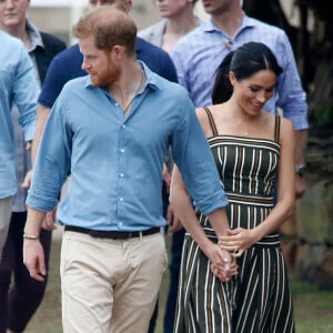 Le prince Harry, duc de Sussex, et Meghan Markle, duchesse de Sussex, enceinte, en visite à Bondi Beach dans la banlieue de Sydney, le 19 octobre 2018. Ils y ont rencontré Danielle Bazergy, étonnant sosie de Meghan.