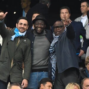 Camille Combal, Basile Boli et Margarita Louis-Dreyfus dans les tribunes du stade Vélodrome lors du match de football de ligue 1 opposant le Paris Saint-Germain (PSG) à 'Olympique de Marseille (OM) à Marseille, France, le 28 octobre 2018. Le PSG a gagné 2-0. © Lionel Urman/Bestimage