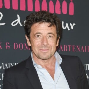 Patrick Bruel - L'association 12 de coeur (vignerons et négociants en vin français) remet un chèque de 800 000 euros aux Restos du Coeur, produit d'une vente aux enchères caritative de lots de vin à Hong Kong en mai dernier. Paris, le 16 octobre 2018. © Coadic Guirec / Bestimage