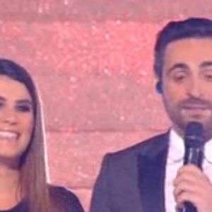 Karine Ferri et Camille Combal main dans la main dans "Danse avec les stars 9" sur TF1. Le 8 novembre 2018.
