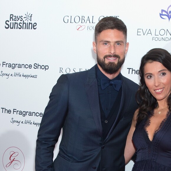 Olivier Giroud et sa femme Jennifer Giroud - Les célébrités posent lors du photocall de la soirée Global Gift à Londres le 2 novembre 2018.
