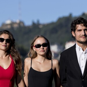 Louis Garrel, Laetitia Casta et Lily-Rose Depp au photocall de "L'homme Fidèle" au 66ème Festival du Film de Saint-Sébastien, le 22 septembre 2018.