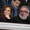 Dominique Farrugia et sa femme Isabelle - Huitième de finale retour entre le Paris Saint-Germain et le Bayer Leverkusen au Parc des Princes remporté par les parisiens sur le score de 2-1 à Paris le 12 mars 2014.