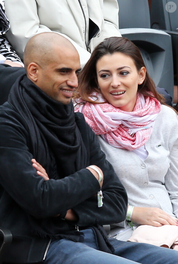 Aurelien Capoue et sa femme Rachel Legrain-Trapani - People aux Internationaux de France de tennis de Roland Garros à Paris, le 28 mai 2014.