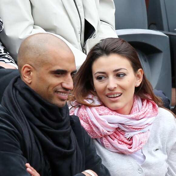 Aurelien Capoue et sa femme Rachel Legrain-Trapani - People aux Internationaux de France de tennis de Roland Garros à Paris, le 28 mai 2014.