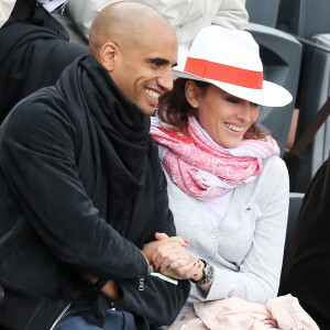 Aurelien Capoue et sa femme Rachel Legrain-Trapani - People aux Internationaux de France de tennis de Roland Garros à Paris, le 28 mai 2014.