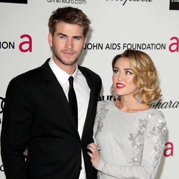 Liam Hemsworth et Miley Cyrus - Soirée pour les 20e Annual Academy Awards eu bénéfice de la fondation Elton John à West Hollywood le 26 février 2012.