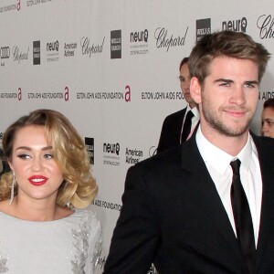 Liam Hemsworth et Miley Cyrus - Soirée pour les 20e Annual Academy Awards eu bénéfice de la fondation Elton John à West Hollywood le 26 février 2012.