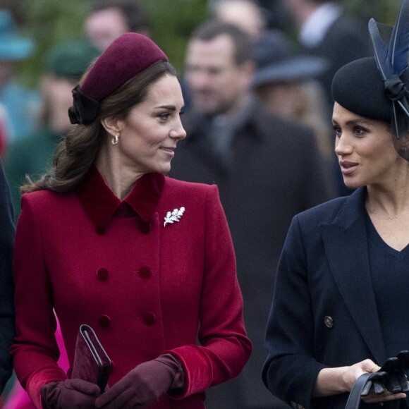Kate Middleton, duchesse de Cambridge, et Meghan Markle, duchesse de Sussex, enceinte, à la messe de Noël à l'église Sainte-Marie-Madeleine à Sandringham, le 25 décembre 2018.