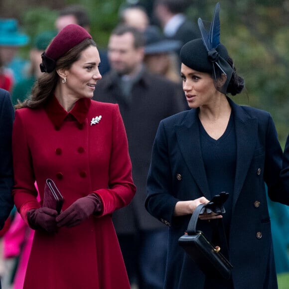 Kate Middleton, duchesse de Cambridge, et Meghan Markle, duchesse de Sussex, enceinte, à la messe de Noël à l'église Sainte-Marie-Madeleine à Sandringham, le 25 décembre 2018.