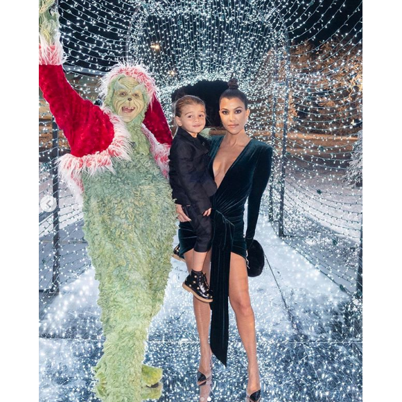 Kourtney Kardashian et son fils Reign à la fête de Noël familiale le 24 décembre 2018.
