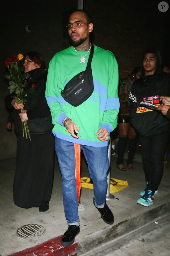 Chris Brown est allé faire la fête avec des amies chez Poppy à West Hollywood, le 5 avril 2018