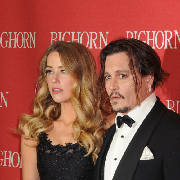 Johnny Depp et Amber Heard à la 27e soirée annuelle du Festival du film de Palm Springs au "Convention Center" à Palm Springs le 2 janvier 2016.