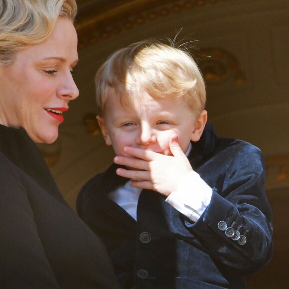 La princesse Charlene de Monaco et son fils le prince héréditaire Jacques de Monaco assistant depuis le balcon du palais princier à la procession des reliques de Sainte Dévote à Monaco le 27 janvier 2019. ©Claudia Albuquerque/Bestimage