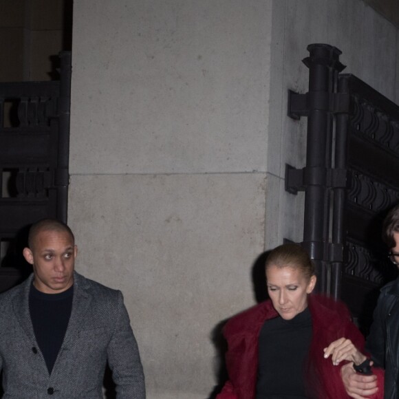 Semi-exclusif - Céline Dion (Manteau en tulle rouge) et Pepe Munoz à la sortie du restaurant Girafe à Paris, France, le 27 janvier 2019.