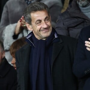 Nicolas Sarkozy dans les tribunes du Parc des Princes lors du match de football de ligue 1 opposant le Paris Saint-Germain (PSG) au Stade rennais FC à Paris, le 27 janvier 2019. Le PSG a gagné 4-1.