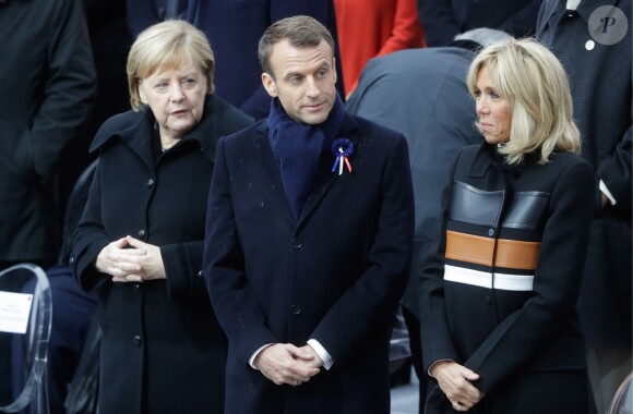 La chancelière allemande Angela Merkel, le président de la République française Emmanuel Macron et sa femme la Première Dame Brigitte Macron (Trogneux) - Cérémonie internationale du centenaire de l'Armistice du 11 novembre 1918 à l'Arc de Triomphe à Paris, France, le 18 novembre 2018.