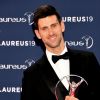 Novak Djokovic pose avec son Laureus lors de la soirée des "Laureus World sports Awards" à Monaco, le 18 février 2019. © Bruno Bebert/Bestimage