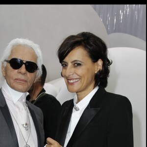 Karl Lagerfeld et Inès de la Fressange au défilé Chanel, collection prêt-à-porter printemps-été 2012. Paris, le 4 octobre 2011.