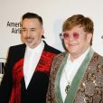 David Furnish et son mari Elton John à la soirée caritative AIDS Foundation Academy Awards Viewing Party à Los Angeles, le 24 février 2019