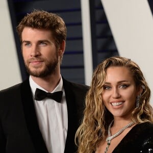 Miley Cyrus et son mari Liam Hemsworth à la soirée Vanity Fair Oscar Party à Los Angeles, le 24 février 2019