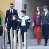 La famille Beckham (David Beckham, Victoria Beckham, Harper Beckham, Romeo Beckham, Cruz Beckham, Brooklyn Beckham et sa compagne Hana Cros) quitte le défilé de Victoria Beckham lors de la London Fashion Week le 17 février 2019.