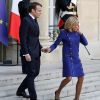 Le président Emmanuel Macron, la première dame Brigitte Macron - Le président de la République française et la première dame raccompagnent le président de la République populaire de Chine et sa femme à l'issue de la visite d'Etat de 2 jours qui s'achève par un entretien au palais de l'Elysée à Paris le 26 mars 2019. © Stéphane Lemouton / Bestimage