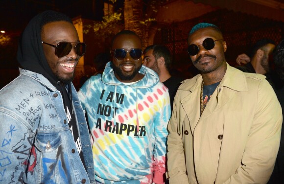 Dadju (Dadju Djuna Nsungula), son frère Maître Gims (Gandhi Djuna) et Djibril Cissé lors de la soirée de lancement de la collection capsule "I'm not a rapper" de la marque ElevenParis à Paris, France, le 11 avril 2019. © Veeren/Bestimage