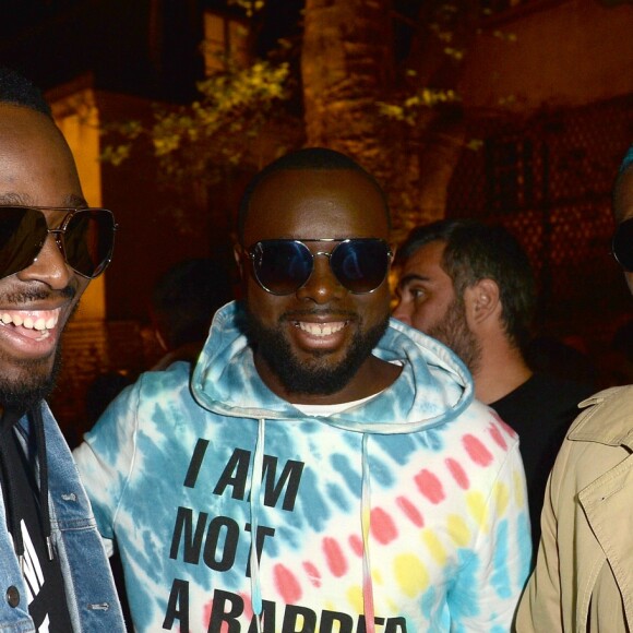 Dadju (Dadju Djuna Nsungula), son frère Maître Gims (Gandhi Djuna) et Djibril Cissé lors de la soirée de lancement de la collection capsule "I'm not a rapper" de la marque ElevenParis à Paris, France, le 11 avril 2019. © Veeren/Bestimage