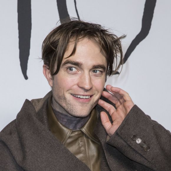 Robert Pattinson lors du photocall du défilé Christian Dior Homme automne hiver 2019/2020 au Champs de Mars à Paris le 18 janvier 2019. © Olivier Borde / Bestimage