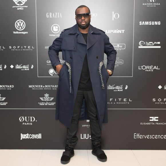Exclusif - Le rappeur Gims (Maître Gims - Gandhi Djuna) lors du photocall de la 14ème édition du Casa Fashion Show au Sofitel Casablanca Tour Blanche à Casablanca, Maroc, le 20 avril 2019. Sept ans déjà que le Casa Fashion Show promeut la femme marocaine citoyenne du monde. Devenu un rendez-vous incontournable et placé sous le Haut Patronage de Sa Majesté le Roi du Maroc, l'événement porté par K.Cheddadi et chorégraphié par H.Ghorab, se veut le reflet d'une société plurielle et avant-gardiste, jonglant avec brio entre ses racines orientales et sa culture occidentale. Une société solidaire également... L'événement soutenant depuis son lancement l'Association des Bonnes Œuvres du Coeur dont l'objectif est de redonner un souffle de vie et d'espoir aux bébés bleus. Le Casa Fashion Show dévoile au public marocain les collections Printemps/Eté 2019 des griffes les plus prestigieuses : de Etro à Oud Paris, en passant par Elisabetta Franchi, Pinko, Dice Kayek, Just Cavalli ou encore Orza Couture... Les créateurs marocains Lina Cahill et Sara Chraibi revisitent la robe du soir, avec cet oeil aiguisé et ce sens pointu du détail qui les caractérisent. Le talentueux couturier tunisien, Ali Karoui (souvent surnommé le nouveau Azzedine Alaia), est présent pour la seconde fois consécutive. Enfin, l'enseigne marocaine de luxe IO sera la chaussure officielle de l'événement et l'Oréal Paris, le partenaire coiffure et make up du show. © Philippe Doignon/Bestimage