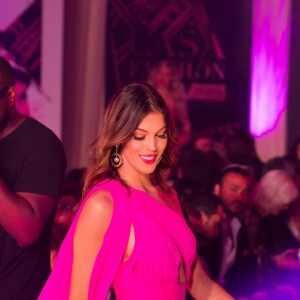 Exclusif - Le rappeur Gims (Maître Gims - Gandhi Djuna) et Iris Mittenaere (Miss France 2016 et Miss Univers 2016) lors du défilé de la 14ème édition du Casa Fashion Show au Sofitel Casablanca Tour Blanche à Casablanca, Maroc, le 20 avril 2019. Sept ans déjà que le Casa Fashion Show promeut la femme marocaine citoyenne du monde. Devenu un rendez-vous incontournable et placé sous le Haut Patronage de Sa Majesté le Roi du Maroc, l'événement porté par K.Cheddadi et chorégraphié par H.Ghorab, se veut le reflet d'une société plurielle et avant-gardiste, jonglant avec brio entre ses racines orientales et sa culture occidentale. Une société solidaire également… L'événement soutenant depuis son lancement l’Association des Bonnes Œuvres du Cœur dont l’objectif est de redonner un souffle de vie et d’espoir aux bébés bleus. Le Casa Fashion Show dévoile au public marocain les collections Printemps/Eté 2019 des griffes les plus prestigieuses : de Etro à Oud Paris, en passant par Elisabetta Franchi, Pinko, Dice Kayek, Just Cavalli ou encore Orza Couture… Les créateurs marocains Lina Cahill et Sara Chraibi revisitent la robe du soir, avec cet œil aiguisé et ce sens pointu du détail qui les caractérisent. Le talentueux couturier tunisien, Ali Karoui (souvent surnommé le nouveau Azzedine Alaia), est présent pour la seconde fois consécutive. Enfin, l’enseigne marocaine de luxe IO sera la chaussure officielle de l’événement et l’Oréal Paris, le partenaire coiffure et make up du show. © Philippe Doignon/Bestimage