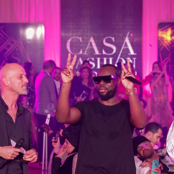 Exclusif - Le rappeur Gims (Maître Gims - Gandhi Djuna) et la chanteuse Vitaa lors du défilé de la 14ème édition du Casa Fashion Show au Sofitel Casablanca Tour Blanche à Casablanca, Maroc, le 20 avril 2019. Sept ans déjà que le Casa Fashion Show promeut la femme marocaine citoyenne du monde. Devenu un rendez-vous incontournable et placé sous le Haut Patronage de Sa Majesté le Roi du Maroc, l'événement porté par K.Cheddadi et chorégraphié par H.Ghorab, se veut le reflet d'une société plurielle et avant-gardiste, jonglant avec brio entre ses racines orientales et sa culture occidentale. Une société solidaire également… L'événement soutenant depuis son lancement l’Association des Bonnes Œuvres du Cœur dont l’objectif est de redonner un souffle de vie et d’espoir aux bébés bleus. Le Casa Fashion Show dévoile au public marocain les collections Printemps/Eté 2019 des griffes les plus prestigieuses : de Etro à Oud Paris, en passant par Elisabetta Franchi, Pinko, Dice Kayek, Just Cavalli ou encore Orza Couture… Les créateurs marocains Lina Cahill et Sara Chraibi revisitent la robe du soir, avec cet œil aiguisé et ce sens pointu du détail qui les caractérisent. Le talentueux couturier tunisien, Ali Karoui (souvent surnommé le nouveau Azzedine Alaia), est présent pour la seconde fois consécutive. Enfin, l’enseigne marocaine de luxe IO sera la chaussure officielle de l’événement et l’Oréal Paris, le partenaire coiffure et make up du show. © Philippe Doignon/Bestimage