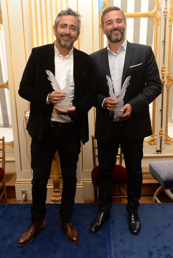 Eric Toledano et Olivier Nakache - Remise du "French Cinéma Award" à Olivier Nakache et Eric Toledano lors du 21ème rendez-vous du cinéma français au ministère de la Culture à Paris, le 17 janvier 2019. © Ramsamy Veeren/Bestimage