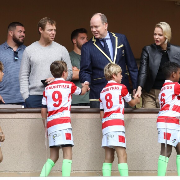 Le prince Albert II et la princesse Charlène de Monaco avec leurs enfants le prince Jacques de Monaco, la princesse Gabriella de Monaco et Gareth Wittstock, (frère de la princesse Charlene) lors de la 9ème édition du Tournoi Sainte Dévote de Rugby au Stade Louis II à Monaco, le 11 mai 2019. © Jean-Charles Vinaj/Pool/Bestimage