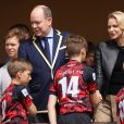 Le prince Albert II et la princesse Charlène de Monaco lors de la 9ème édition du Tournoi Sainte Dévote de Rugby au Stade Louis II à Monaco, le 11 mai 2019. © Jean-Charles Vinaj/Pool/Bestimage