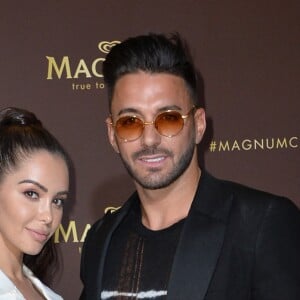 Nabilla Benattia et son mari Thomas Vergara au photocall de l'after party "Magnum x Rita Ora" sur la plage privé Magnum lors du 72e Festival International du Film de Cannes, France,le 16 mai 2019. © Veeren/Bestimage