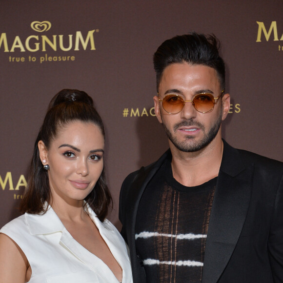 Nabilla Benattia et son mari Thomas Vergara au photocall de l'after party "Magnum x Rita Ora" sur la plage privé Magnum lors du 72e Festival International du Film de Cannes, France,le 16 mai 2019. © Veeren/Bestimage