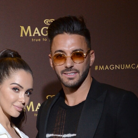 Nabilla Benattia et son mari Thomas Vergara au photocall de l'after party "Magnum x Rita Ora" sur la plage privé Magnum lors du 72e Festival International du Film de Cannes, France,le 16 mai 2019. © Veeren/Bestimage