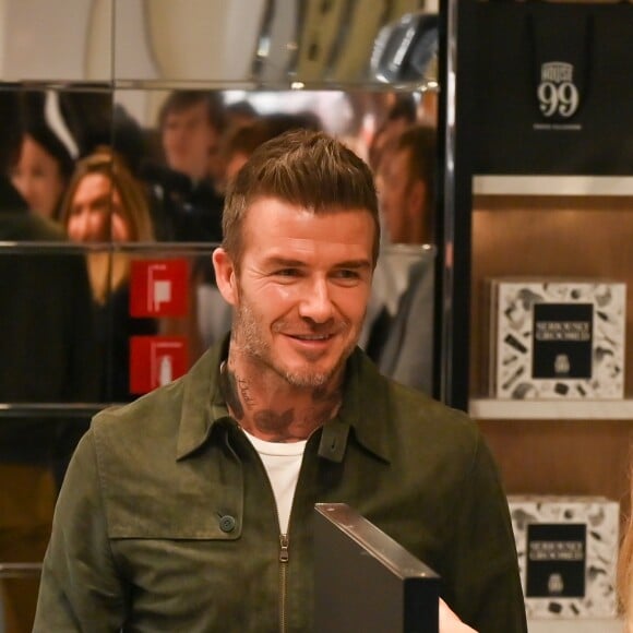 David Beckham fait la promotion de ses produits cosmétiques pour hommes House 99 (soins pour le visage, la barbe, le corps et les cheveux) dans la boutique éphémère le de House 99 aux Galeries Lafayette Champs-Élysées, à Paris, France, le 21 mai 2019.