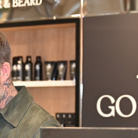 David Beckham fait la promotion de ses produits cosmétiques pour hommes House 99 (soins pour le visage, la barbe, le corps et les cheveux) dans la boutique éphémère le de House 99 aux Galeries Lafayette Champs-Élysées, à Paris, France, le 21 mai 2019.