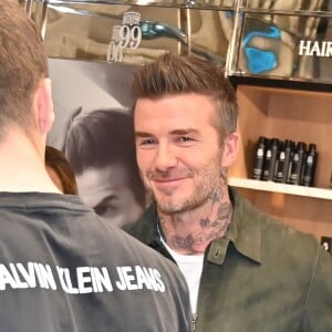 David Beckham fait la promotion de ses produits cosmétiques pour hommes House 99 (soins pour le visage, la barbe, le corps et les cheveux) dans la boutique éphémère le de House 99 aux Galeries Lafayette Champs-Élysées, à Paris, France, le 21 mai 2019.