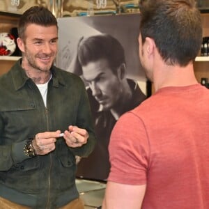 David Beckham fait la promotion de ses produits cosmétiques pour hommes House 99 (soins pour le visage, la barbe, le corps et les cheveux) dans la boutique éphémère le de House 99 aux Galeries Lafayette Champs-Élysées, à Paris, France, le 21 mai 2019.