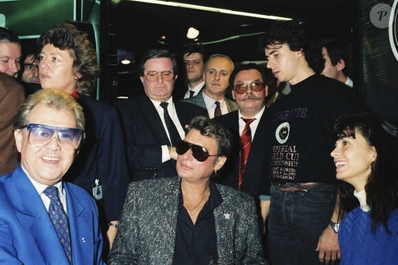 Archives - Michou, Johnny Hallyday et Adeline Blondiau à la foire de Paris en 1991. © Patrick Carpentier / Bestimage
