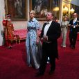Ivanka Trump (robe Carolina Herrera) et le secrétaire d'Etat au commerce international Liam Fox arrivant dans la salle de bal du palais de Buckingham le 3 juin 2019 pour le dîner de gala donné par la reine Elizabeth II en l'honneur de la visite officielle du président américain Donald Trump et son épouse Melania.