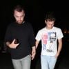 Exclusif - Sam Smith et Brandon Flynn se baladent main dans la main dans les rues de Beverly Hills après un diner romantique au restaurant Matsuhisa, le 5 juin 2018