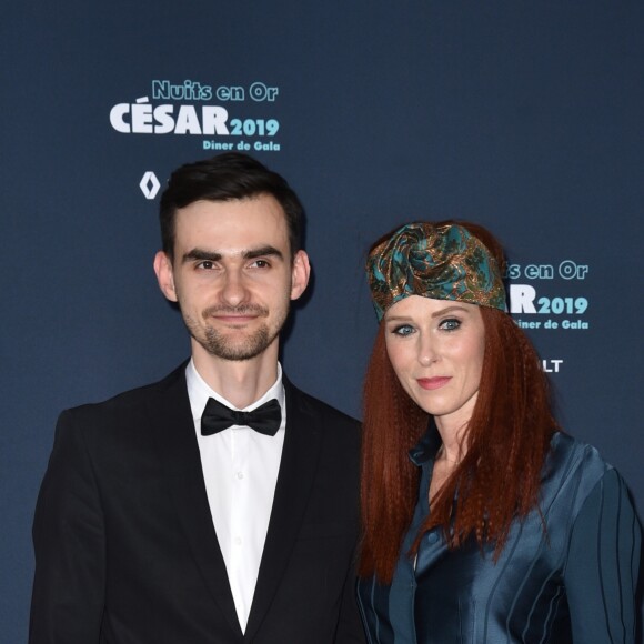 Pavlo Ostrikov (Golden Dziga 2018 du Meilleur Court Métrage pour "Vipusk'97") et Audrey Fleurot - Photocall du 9ème dîner de gala des Nuits En Or 2019 à l'Unesco à Paris, le 17 juin 2019. © Giancarlo Gorassini/Bestimage